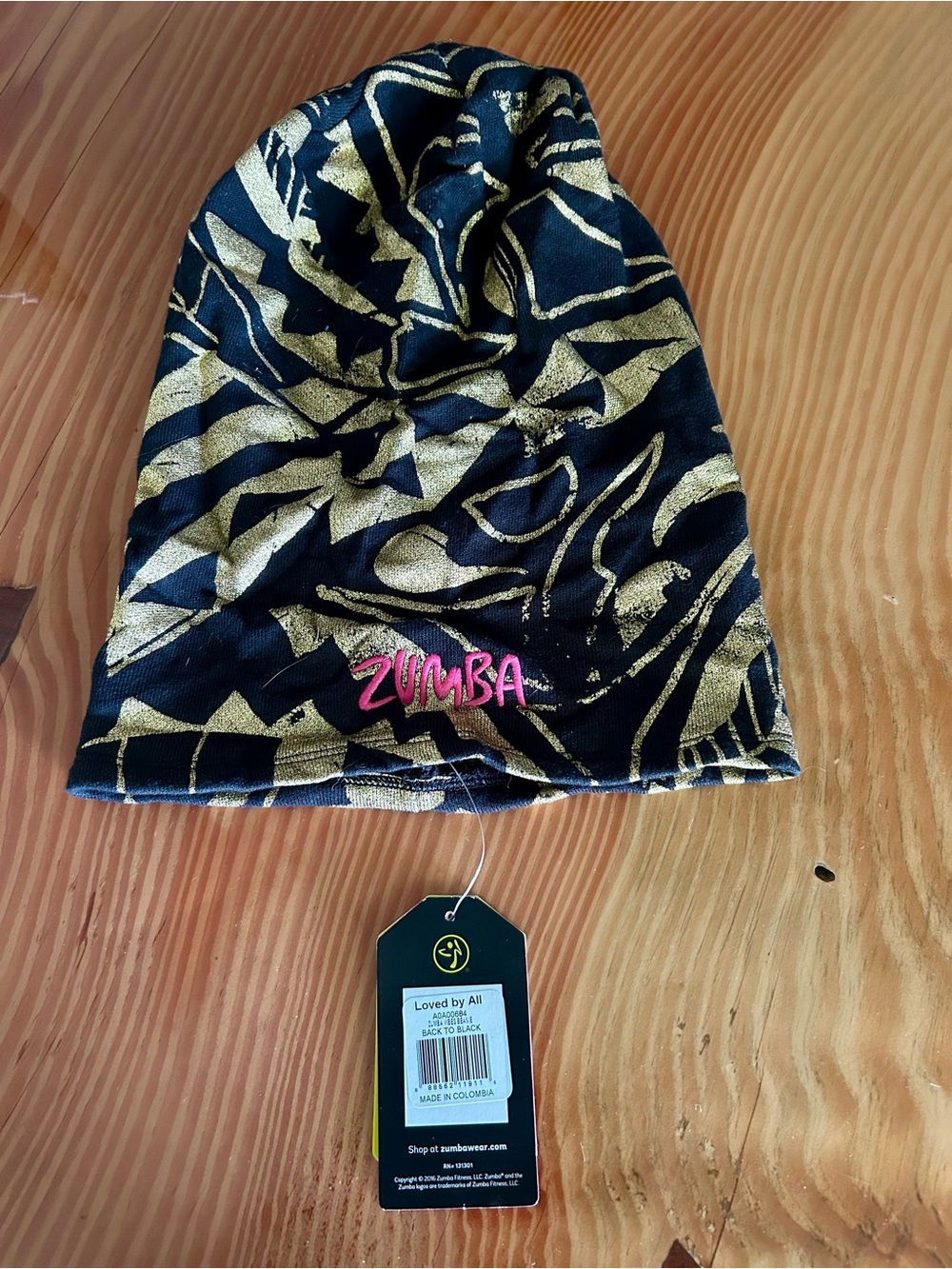 Zumba Fitness Black and Gold Patterned Slouch Beanie with Pink Logo
